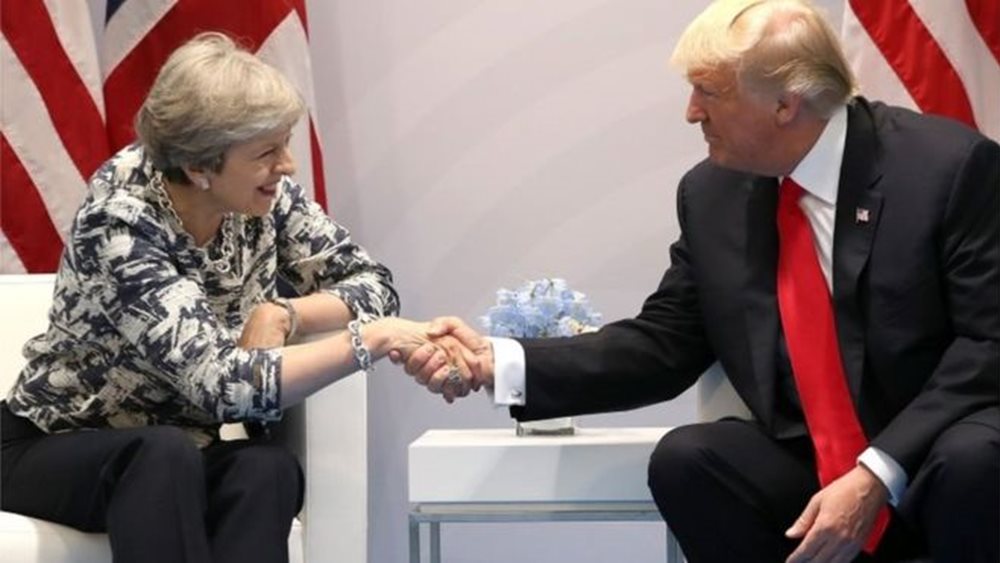 T. May: Ο Trump είναι αφοσιωμένος στο συμφέρον των ΗΠΑ