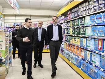Consumers can already see lower prices on the shelf, PM says after visiting Athens supermarket