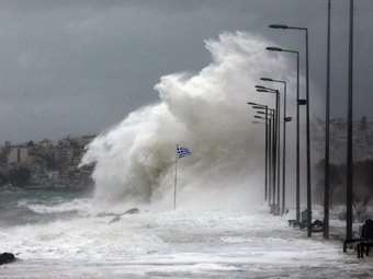 Ships remain docked at Pireaus port due to gale - force winds