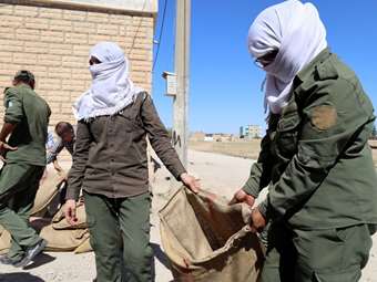 Σφοδρές μάχες φιλοτουρκικών και κουρδικών πολιτοφυλακών στη βόρεια Συρία